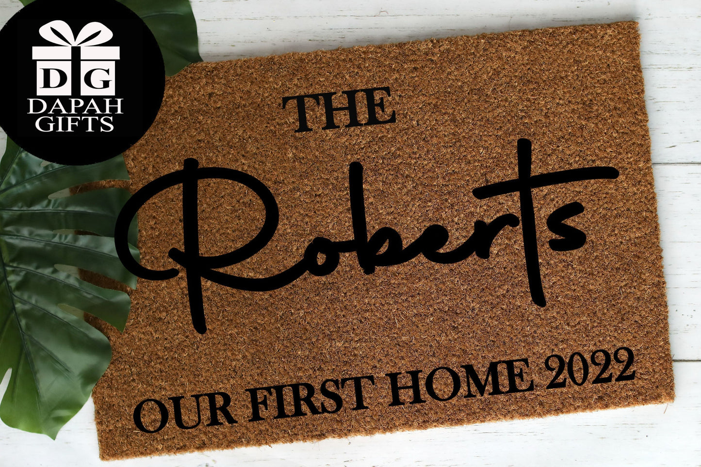 The [CUSTOM NAME] our first home [CUSTOM YEAR] - Coir Doormat - DAPAH Creations